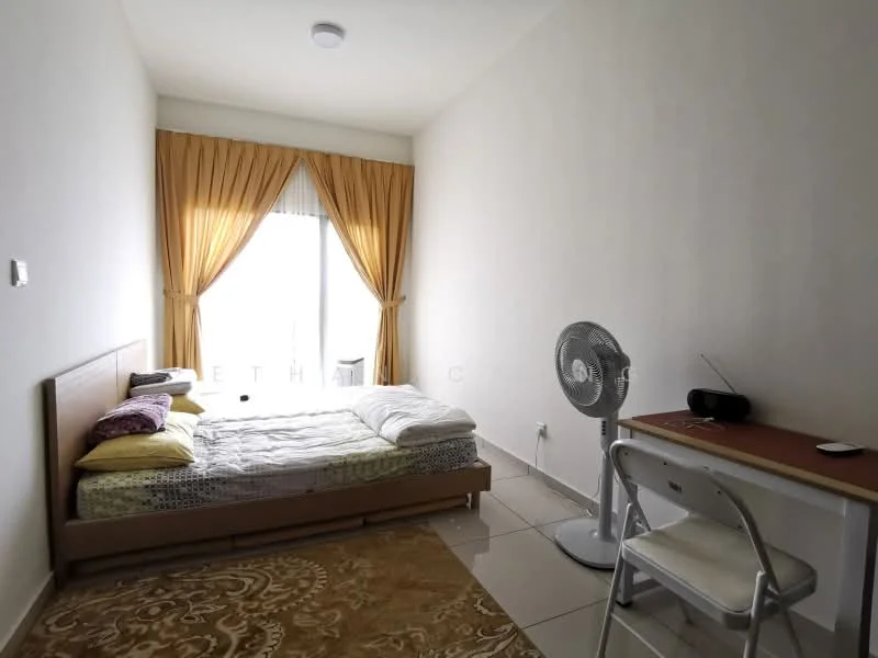 Bedroom features: queen-size bed, white bedding, wooden bed frame, two decorative pillows, floor-to-ceiling windows, sheer curtains, golden drapes, white walls, tile flooring, ceiling light, desk with chair, fan, area rug with intricate pattern; style: modern.