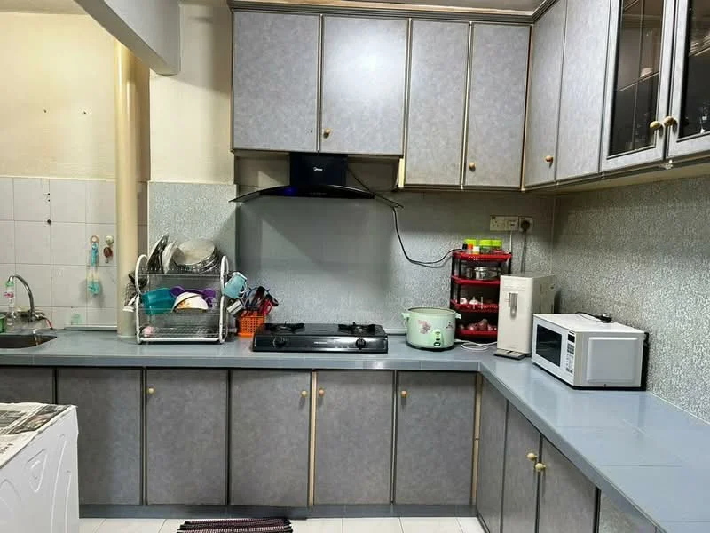Kitchen features: grey laminate cabinetry, stainless-steel sink, chrome pull-down faucet, 4-burner gas hob, built-in range hood, microwave, dish rack, countertop with grey surface, white tiled backsplash, white tiled flooring, wall-mounted storage, appliance storage, kitchen utensils, open shelving; style: modern.