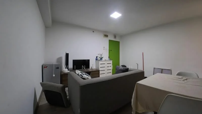Living features: white painted walls, grey fabric sofa, wooden TV console, flat-screen TV, mini fridge, white dresser, green door, table with tablecloth, plastic dining chairs, flooring with tiles, ceiling light fixture; style: modern.