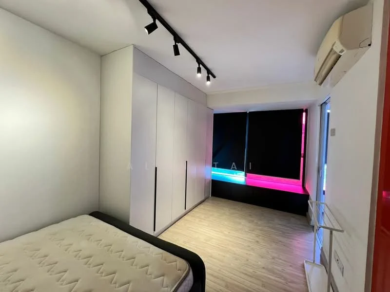 Bedroom features: white painted walls, light wood flooring, built-in wardrobe with sliding doors, 1 wall-mounted split AC, track lighting, large window with black-out curtains, bed frame without mattress, minimalist decor; style: modern.