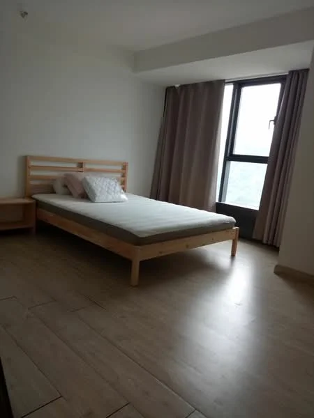Bedroom features: wooden bed frame, mattress without bedding, nightstand, floor-to-ceiling window, curtains, laminate flooring, plain white walls, minimalist decor; style: modern; view: city.