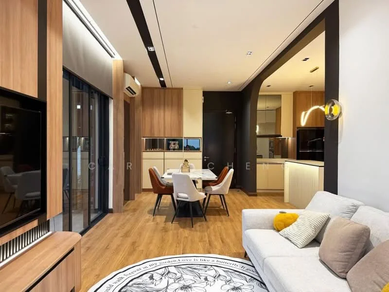 Living features: light grey fabric sofa, round area rug with geometric pattern, wall-mounted TV, wooden TV console, recessed ceiling lights, pendant light fixture, floor-to-ceiling windows, wooden flooring, decorative wall with wood paneling, dining table with four chairs, open kitchen layout; style: modern.