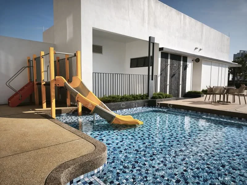 Exterior type: swimming pool deck; features: swimming pool with mosaic tile, yellow water slide, playground structure with slide, outdoor dining area with table and chairs, concrete pool deck, landscaped area with plants, fenced area, sunny weather, modern architectural design; style: modern.