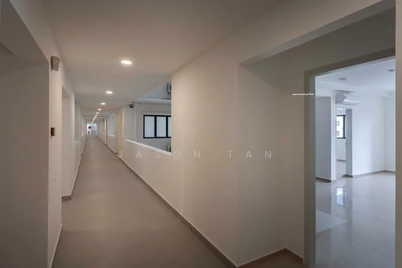 Room features: white painted walls, grey tiled flooring, recessed lighting, multiple doorways, windows with black frames, open corridor layout, smooth ceiling, handrail along the corridor; style: modern.