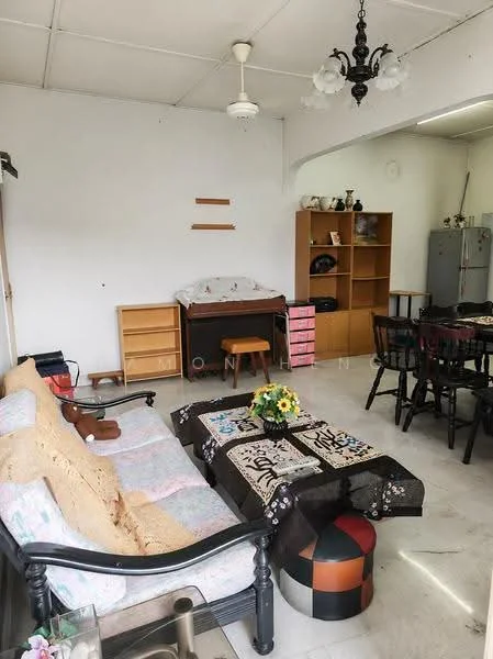 Living features: 3-seater fabric sofa in beige, coffee table with decorative cloth, ceiling fan, chandelier with multiple bulbs, wooden shelving unit, dining table with black chairs, white painted walls, marble flooring, decorative flower arrangement, wooden side table, wall-mounted storage, open space layout; style: traditional.