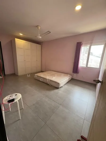 Bedroom features: light grey tiled flooring, pink painted walls, ceiling fan, large built-in wardrobe with white doors, window with purple curtains, unmade bed with mattress, white side table, natural light from window; style: modern.