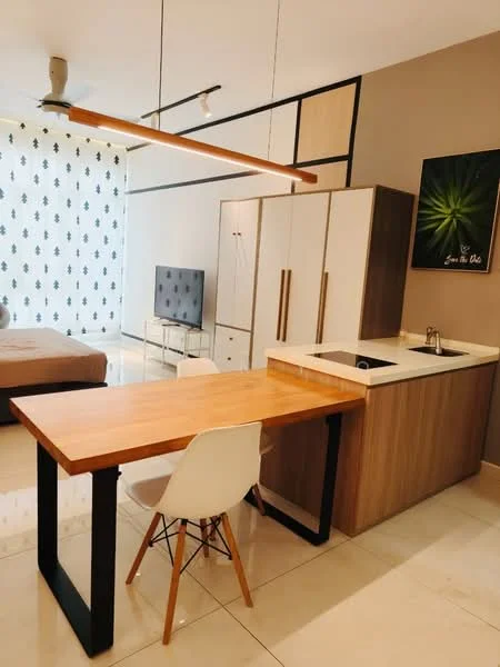 Kitchen features: wooden dining table with black metal legs, white dining chair, single-bowl stainless-steel sink, chrome pull-down faucet, laminate countertop, wood cabinetry, built-in refrigerator, pendant light fixture, cream tiled flooring, wall-mounted TV, decorative wall with patterned wallpaper, recessed lighting, open layout; style: modern.