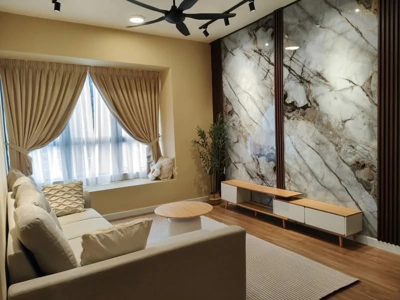 Living features: 3-seater fabric sofa in light grey, round wooden coffee table, TV console with white cabinetry, marble feature wall with grey and white veining, wood paneling on adjacent wall, floor-to-ceiling windows with sheer curtains, light wood flooring, ceiling fan with 5 blades, decorative plant in ceramic pot, area rug with striped pattern, recessed downlights; style: modern.