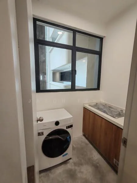 Laundry features: front-load washing machine, white cabinetry, countertop with sink, large window, grey concrete flooring, neutral painted walls; style: modern.