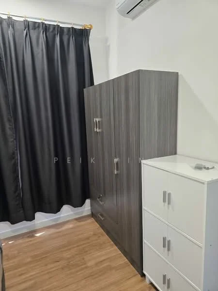 Room features: black curtains, wooden flooring, grey wardrobe with handles, white chest of drawers, wall-mounted air conditioning unit.