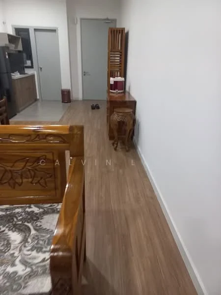 Room features: wooden flooring, white painted walls, wooden furniture, sofa with floral upholstery, wooden side table, wooden stool, door leading to another room, open space layout; style: modern.