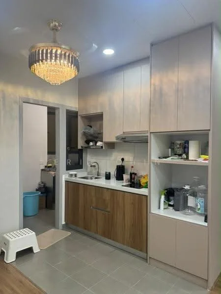 Kitchen features: white cabinets, wooden lower cabinets, marble countertop, stainless-steel sink, chrome pull-down faucet, built-in oven, freestanding range oven, microwave, refrigerator, chandelier light fixture, recessed downlights, tile flooring, open shelving, kitchen appliances, decorative items on countertop; style: modern. Room features: doorway leading to another room, blue trash bin, white step stool.