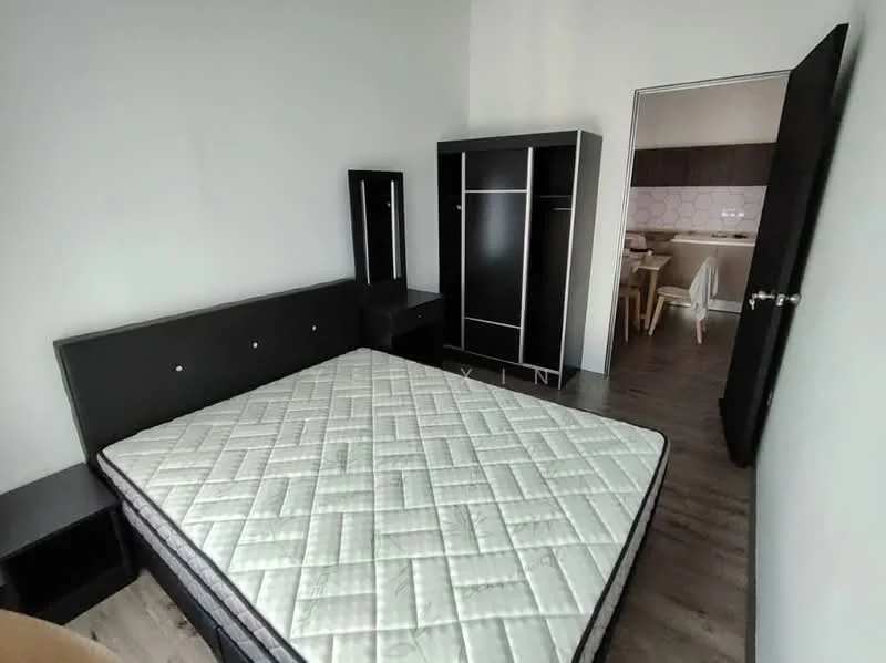 Bedroom features: queen-size bed frame, mattress, black wooden wardrobe, black bedside table, laminate flooring, white painted walls, doorway leading to kitchen, natural light from doorway; style: modern.