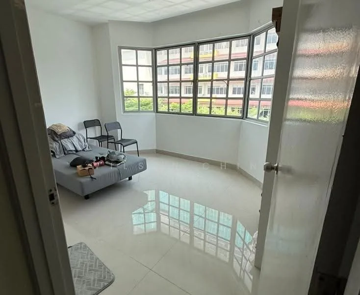 Living features: grey fabric sofa, two black chairs, white painted walls, glossy tile flooring, large bay windows, natural light, minimalist decor, no visible artwork; style: modern; view: garden.