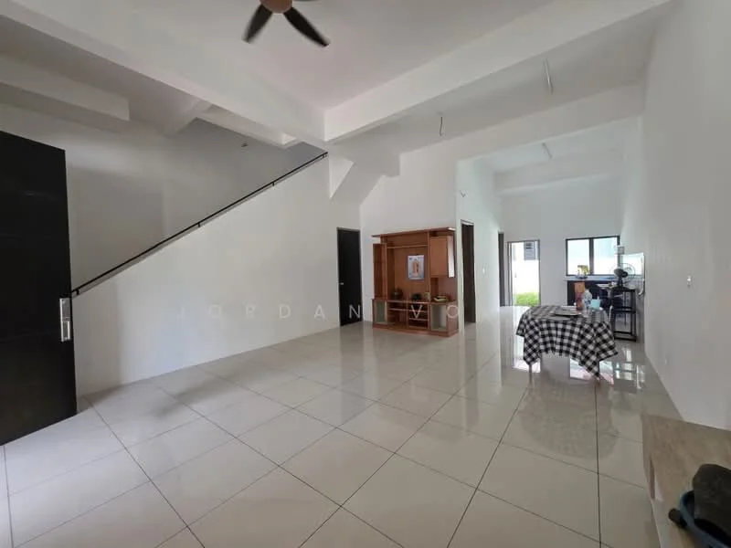 Living features: white painted walls, polished ceramic tile flooring, exposed beams on ceiling, 5-blade ceiling fan, large windows providing natural light, staircase leading to upper level, open layout, decorative wooden shelf unit, checkered tablecloth on table; style: modern. Room features: white painted walls, polished ceramic tile flooring, large windows, open layout.