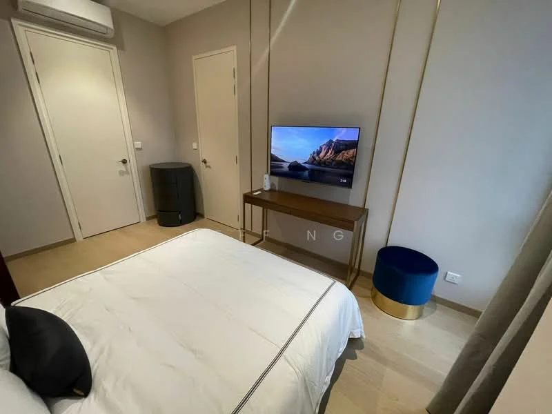 Bedroom features: queen-size bed with white bedding, wall-mounted TV, wooden flooring, light grey painted walls, built-in wardrobe, nightstand, decorative blue stool, air conditioning unit, door leading to hallway, window with curtains; style: modern.