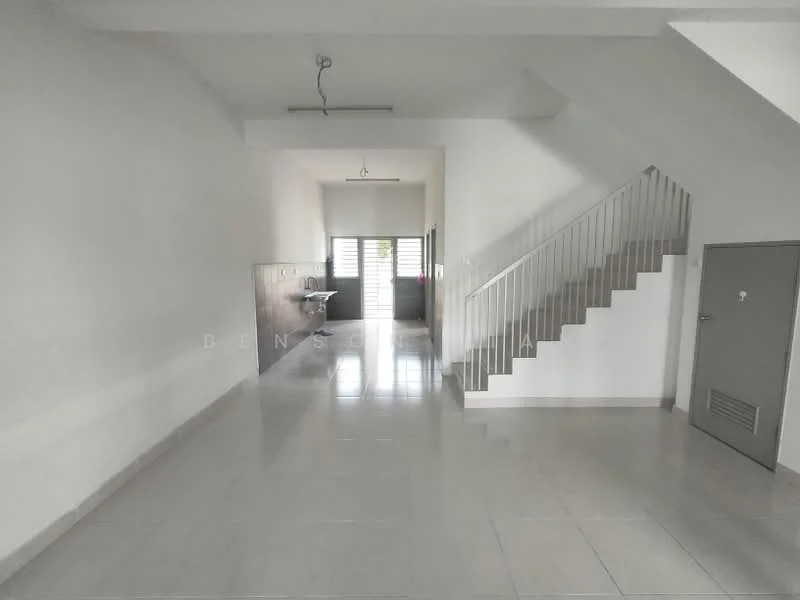 Room features: white painted walls, grey tiled flooring, stainless-steel sink, single-bowl stainless-steel sink, metal railing on staircase, staircase with white risers, large window with horizontal slats, door leading to outdoor area, ceiling light fixture, open layout, no visible furniture; style: modern.