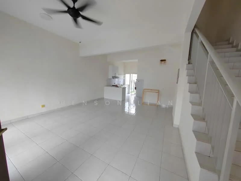 Room features: white painted walls, glossy ceramic tile flooring, 5-blade ceiling fan, large windows, staircase with white railing, open layout, kitchen area visible in background, natural light from windows; style: modern.