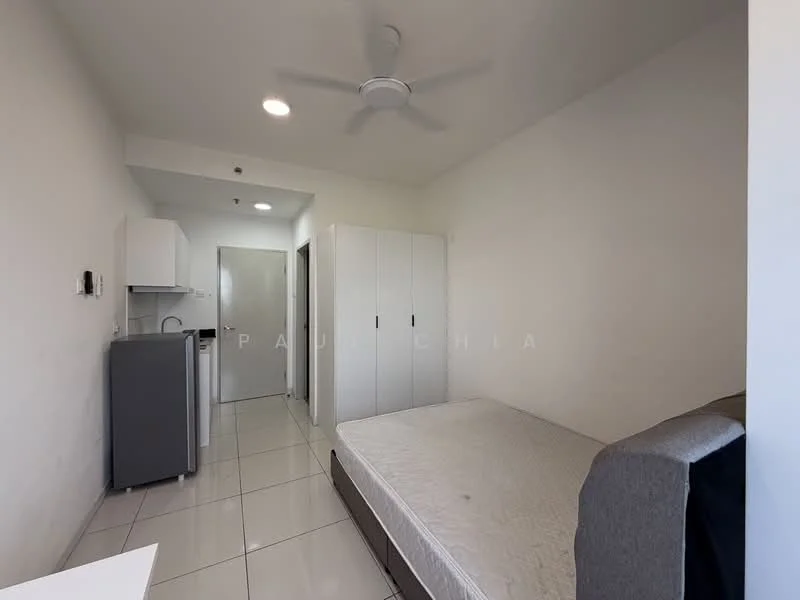 Bedroom features: single bed, upholstered headboard, built-in wardrobe, white painted walls, tile flooring, ceiling fan, fridge, kitchenette with sink, wall-mounted mirror, door to hallway; style: modern.