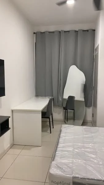 Room features: white painted walls, grey curtains, tile flooring, ceiling fan, desk with chair, mirror, bed with mattress, wall-mounted TV, shelving unit; style: modern.