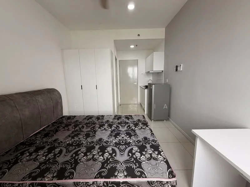 Bedroom features: queen-size bed with upholstered headboard, black and white patterned mattress, white built-in wardrobe, white bedside table, tile flooring, recessed ceiling lights, wall-mounted air conditioning unit, kitchenette with white cabinetry, stainless-steel fridge, white walls; style: modern.