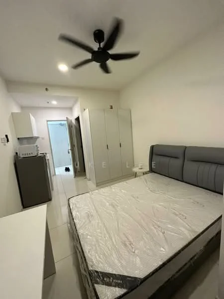 Bedroom features: queen-size bed with grey upholstered headboard, white bedding, ceiling fan with light, white painted walls, tile flooring, built-in wardrobe with sliding doors, small kitchen area with fridge, white countertop, door leading to bathroom, light switch, window with no visible treatment; style: modern.