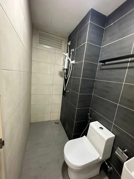 Bathroom features: white toilet, shower with handheld showerhead, grey tile walls, light grey tile flooring, wall-mounted towel rack, window for ventilation, chrome faucet, built-in shower drainage; style: modern.