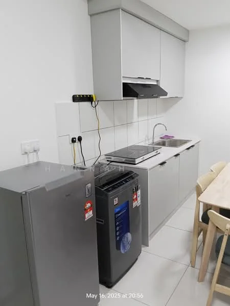 Kitchen features: grey cabinetry, white tiled backsplash, stainless-steel sink, chrome pull-down faucet, built-in electric stove, exhaust hood, refrigerator, washing machine, dining table with chairs, white tiled flooring, wall-mounted electrical outlets, under-cabinet lighting; style: modern.