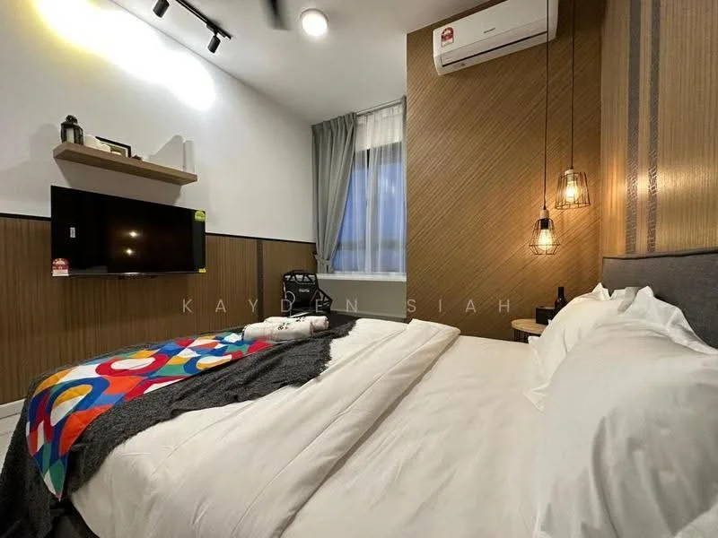 Bedroom features: king-size bed with white bedding, decorative throw blanket with colorful pattern, wood panel accent wall, grey upholstered headboard, wall-mounted TV, shelf above TV, curtains on window, recessed lighting, 1 wall-mounted split AC; style: modern.