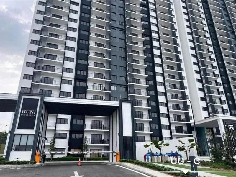 Exterior type: high-rise condominium; features: glass curtain wall, black and white facade, recessed balconies, multiple storeys, landscaped entrance, driveway with interlocking pavers, security gate at entrance; style: modern.