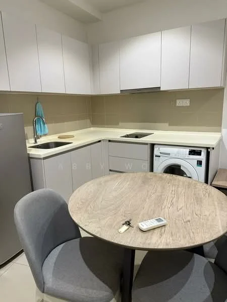 Kitchen features: light grey cabinetry, white countertop, stainless-steel sink, chrome pull-down faucet, built-in electric stove, built-in oven, refrigerator, front-load washing machine, round dining table, two grey upholstered chairs, tile flooring, wall-mounted kitchen hood; style: modern.