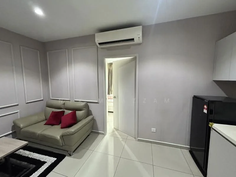 Living features: light grey painted walls, white ceiling, recessed downlights, 3-seater leather sofa in light grey, 2 red decorative cushions, black and white area rug, white cabinetry, black fridge, tile flooring; style: modern. Room features: doorway leading to another room, curtains visible in the background.