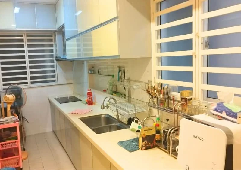Kitchen features: light wood cabinetry, white countertop, double-bowl stainless-steel sink, chrome pull-down faucet, built-in stove, kitchen utensils and containers, window with horizontal slats, wall-mounted fan, tile flooring, open shelving, refrigerator, decorative items on countertop; style: modern.