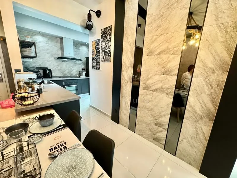 Kitchen features: grey cabinetry, marble backsplash, stainless-steel range hood, built-in oven, freestanding range oven, single-bowl stainless-steel sink, chrome pull-down faucet, grey quartz countertop, black bar stools, dining table with plates and cutlery, pendant lighting, white tiled flooring, open shelving, wall-mounted kitchen appliances; style: modern.