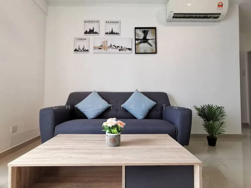 Living features: 3-seater fabric sofa in navy blue, wooden coffee table, decorative plant in ceramic pot, framed artwork on walls, air conditioning unit mounted on wall, light-colored tiled flooring, white painted walls, two blue decorative cushions; style: modern.