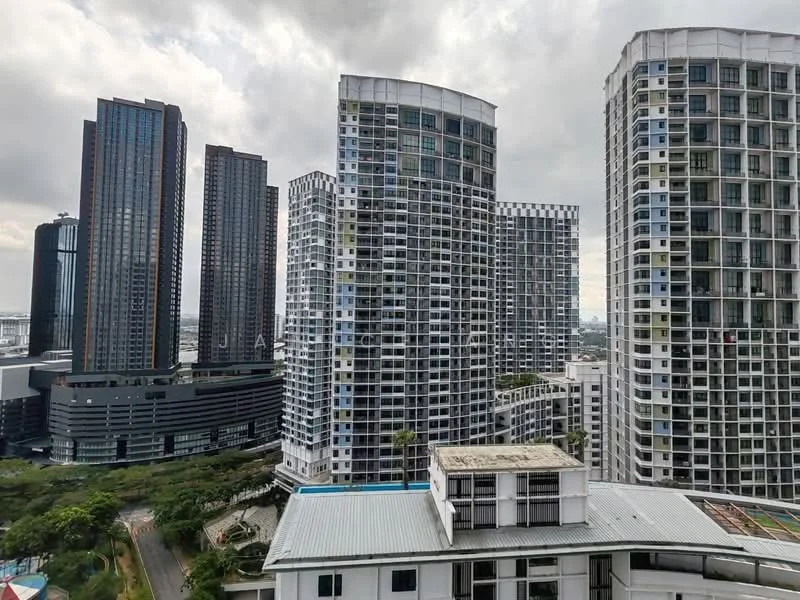Exterior type: high-rise condominium; features: glass curtain wall, white painted facade, recessed balconies, surrounded by mature greenery, urban skyline view, multiple high-rise buildings, mixed-use development, parking structure visible; style: modern.