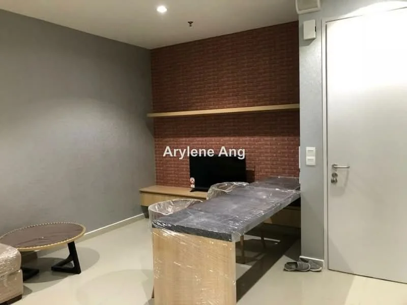 Living features: grey painted walls, exposed brick accent wall, light-colored flooring, wooden TV console, wall-mounted TV, coffee table, plastic wrap on furniture, shelving unit, door with modern handle; style: modern.