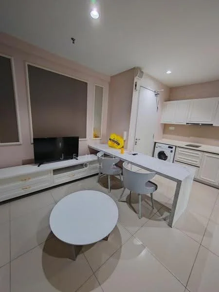 Living features: white painted walls, glossy tile flooring, recessed downlights, wall-mounted TV, white TV console, round coffee table, 4 dining chairs, open kitchen layout, washing machine, white cabinetry, countertop, window with blinds; style: modern.