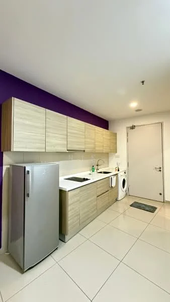 Kitchen features: grey stainless-steel fridge, built-in oven, ceramic cooktop, single-bowl stainless-steel sink, chrome pull-down faucet, white quartz countertop, wood cabinetry with light finish, washing machine, tile flooring, purple accent wall, recessed lighting; style: modern.