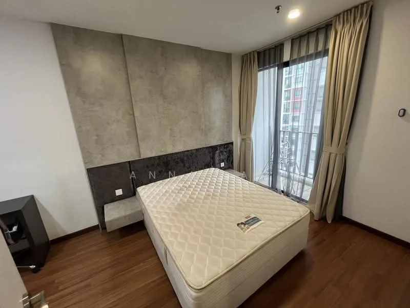 Bedroom features: wooden flooring, grey accent wall, black feature wall, floor-to-ceiling windows, sheer curtains, balcony access, queen-size bed base, no bedding, decorative wall paneling, built-in wardrobe, wall-mounted light switch; style: modern; view: city.