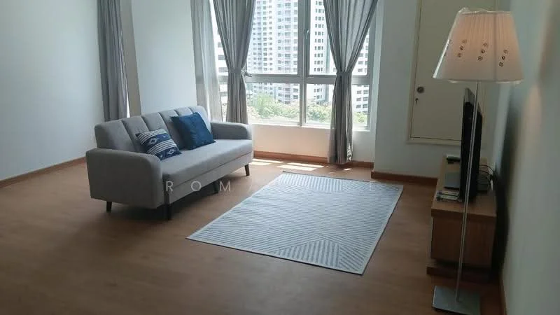 Living features: grey fabric sofa, blue decorative cushions, light wood flooring, floor-to-ceiling windows, sheer curtains, area rug with geometric pattern, wooden TV console, wall-mounted TV, lamp with fabric shade; style: modern; view: city.