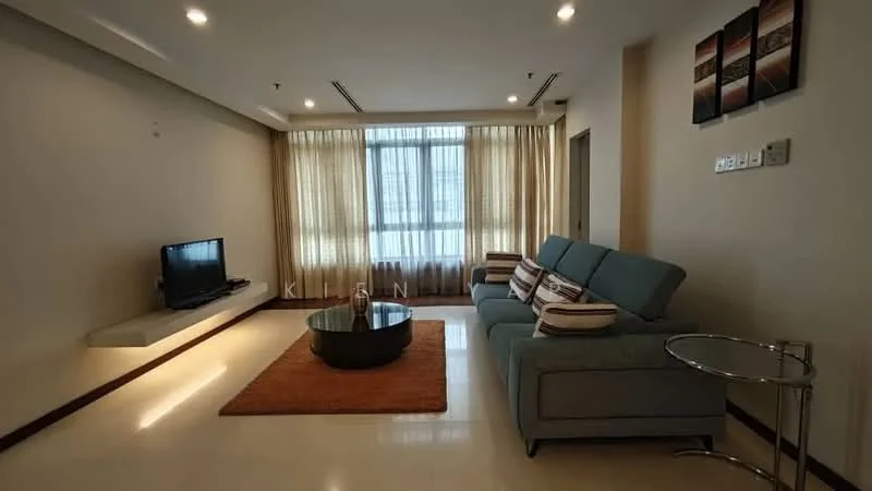 Living features: light beige walls, cream tiled flooring, floor-to-ceiling windows, sheer curtains, 3-seater fabric sofa in light blue, decorative cushions, coffee table with round glass top, area rug in orange, wall-mounted TV, floating TV console, wall art with multiple frames, recessed downlights, side table with chrome base; style: modern; view: city.