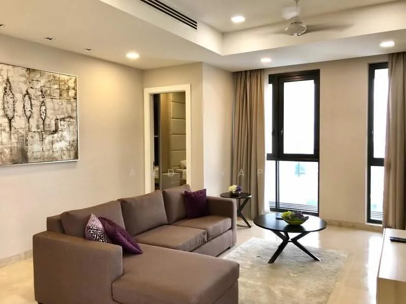 Living features: 3-seater fabric sofa in brown, purple accent pillows, round coffee table with black surface, wall-mounted artwork with abstract design, recessed ceiling lights, ceiling fan, floor-to-ceiling windows, sheer curtains, marble tile flooring, neutral painted walls; style: modern. Room features: doorway leading to bathroom, neutral painted walls.
