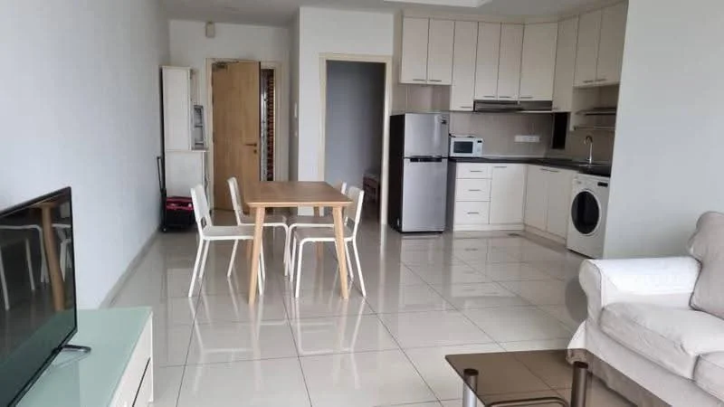 Living features: white painted walls, glossy tile flooring, sofa in light fabric, coffee table, TV console, wall-mounted TV, dining table with 4 white chairs, refrigerator, built-in cabinets, washing machine, oven, stainless-steel sink, countertop with cabinets above; style: modern.