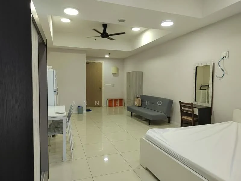 Room features: white painted walls, recessed ceiling lights, 5-blade ceiling fan, glossy tile flooring, sofa bed in grey, dining table with chairs, fridge, built-in wardrobe, air conditioning unit, mirror, wooden chair, empty bed frame; style: modern.