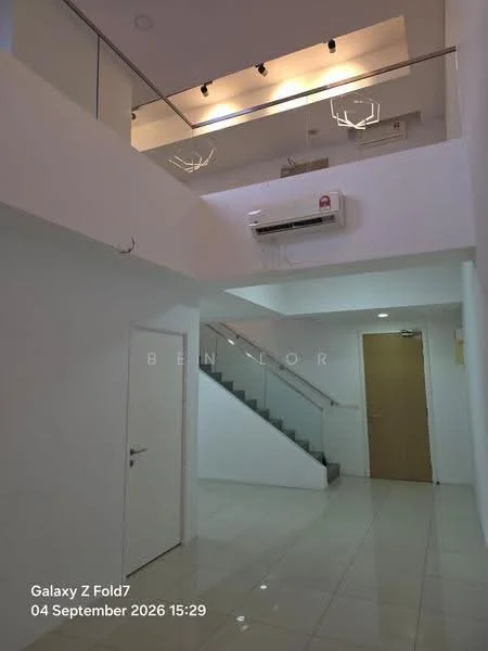 Room features: white painted walls, polished tile flooring, staircase with grey steps, wall-mounted split AC, recessed downlights, glass railing, door leading to another room, ceiling with light fixtures; style: modern.