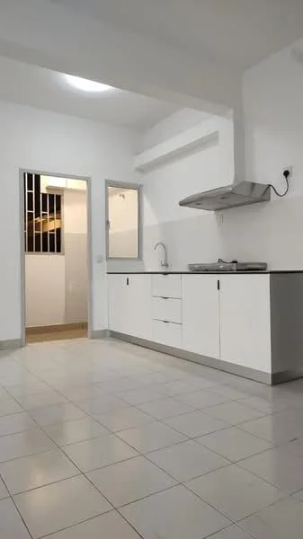 Kitchen features: white cabinetry, black countertop, stainless-steel sink, chrome pull-down faucet, built-in stainless-steel range hood, tile flooring, white walls, recessed ceiling light, open layout, window for natural light, door leading to another room; style: modern.