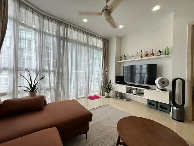Living features: 3-seater fabric sofa in brown, coffee table, wall-mounted TV, TV console, floor-to-ceiling windows with sheer curtains, light-colored walls, ceiling fan, decorative plants, shelves with decorative bottles, area rug with geometric pattern; style: modern; view: city.