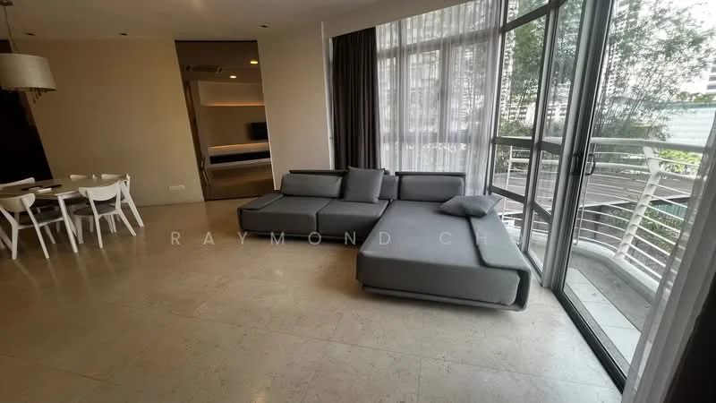 Living features: grey fabric sectional sofa, floor-to-ceiling windows, curtains, light-colored walls, marble flooring, recessed downlights, coffee table, balcony access, decorative wall, open layout to dining area; style: modern; view: garden.