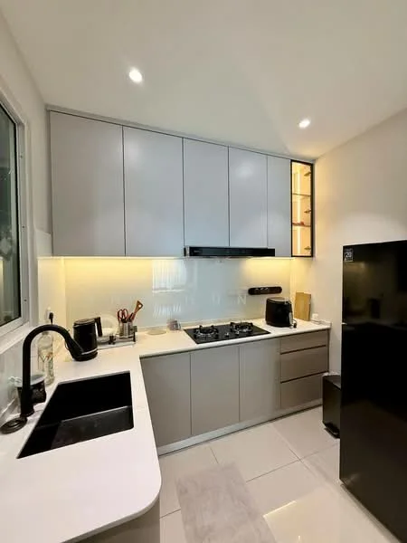 Kitchen features: grey cabinetry, white countertop, single-bowl black sink, chrome pull-down faucet, built-in gas hob with 2 burners, black range hood, black fridge, white tiled backsplash, recessed LED downlights, window with sheer curtains, kitchen towel on countertop; style: modern.